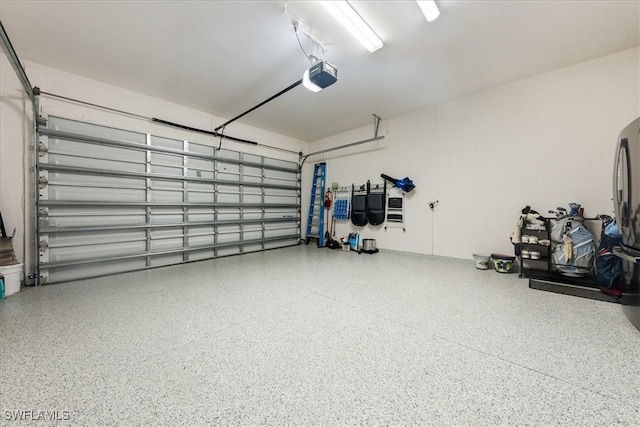 28646 Lobos Cir, Bonita Springs, FL 34135 - garage featuring a garage door opener