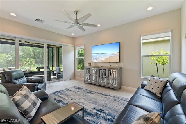 28646 Lobos Cir, Bonita Springs, FL 34135 - tiled living area featuring ceiling fan and recessed lighting