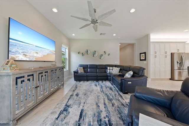 28646 Lobos Cir, Bonita Springs, FL 34135 - living area with a ceiling fan, light marble finish flooring, and recessed lighting