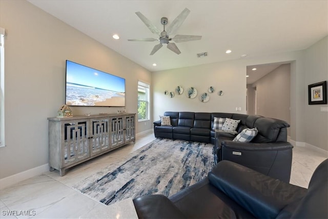 28646 Lobos Cir, Bonita Springs, FL 34135 - living area featuring marble look tiles, ceiling fan, and recessed lighting