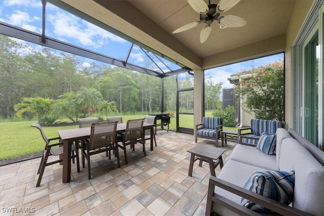 28646 Lobos Cir, Bonita Springs, FL 34135 - sunroom featuring outdoor dining area, an outdoor living space, ceiling fan, and healthy amount of natural light