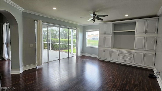 3940 Ruxton Rd, Naples, FL 34116 - unfurnished dining area with arched walkways, ceiling fan, dark wood-style flooring, ornamental molding, and recessed lighting
