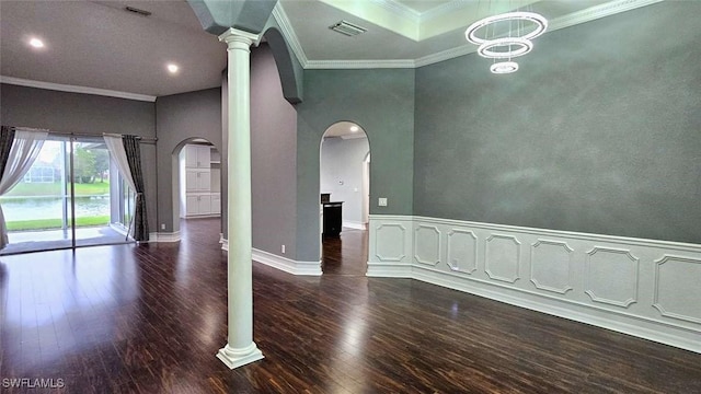 3940 Ruxton Rd, Naples, FL 34116 - empty room featuring hardwood / wood-style floors, arched walkways, crown molding, recessed lighting, and ornate columns