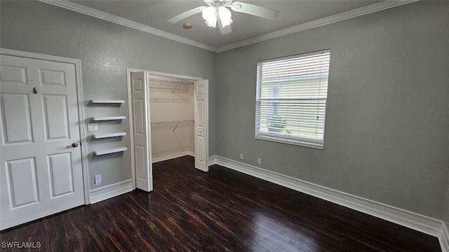 3940 Ruxton Rd, Naples, FL 34116 - unfurnished bedroom featuring dark wood finished floors, ornamental molding, a closet, a textured wall, and a ceiling fan
