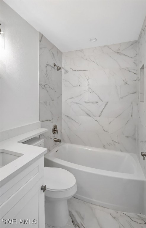 4770 Estero Blvd Unit 509, Fort Myers Beach, FL 33931 - bathroom with vanity,  shower combination, and marble finish flooring