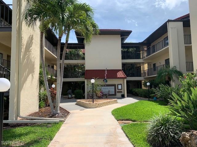 11060 Caravel Cir Unit 104, Fort Myers, FL 33908 - view of apartment building / complex