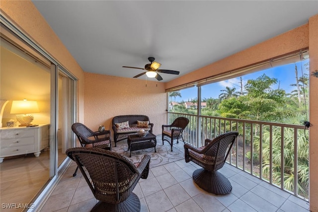 2365 Bayou Ln Unit 10, Naples, FL 34112 - sunroom featuring a ceiling fan and an outdoor living space