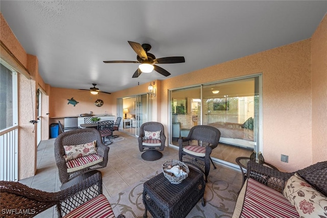 2365 Bayou Ln Unit 10, Naples, FL 34112 - view of patio / terrace featuring an outdoor living space and ceiling fan