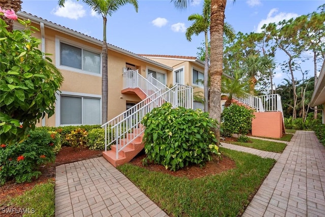 2365 Bayou Ln Unit 10, Naples, FL 34112 - view of property with stairs