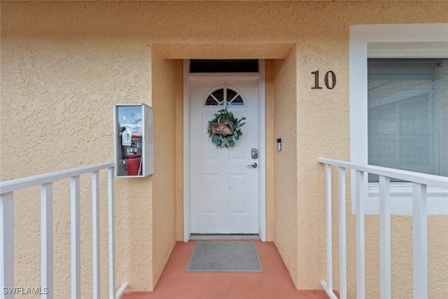 2365 Bayou Ln Unit 10, Naples, FL 34112 - property entrance featuring stucco siding