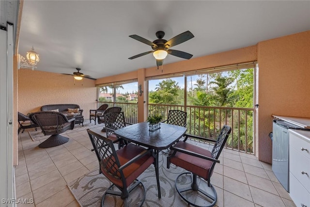 2365 Bayou Ln Unit 10, Naples, FL 34112 - sunroom / solarium with a ceiling fan, outdoor lounge area, and outdoor dining space