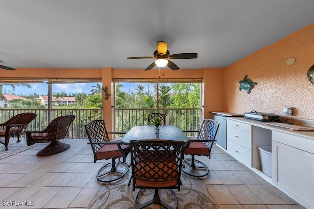 2365 Bayou Ln Unit 10, Naples, FL 34112 - dining area featuring light tile patterned floors and ceiling fan