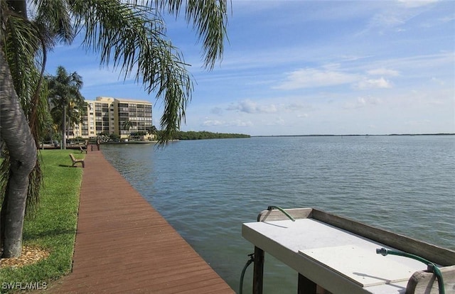 4265 Bay Beach Ln Unit 524, Fort Myers Beach, FL 33931 - dock featuring a water view