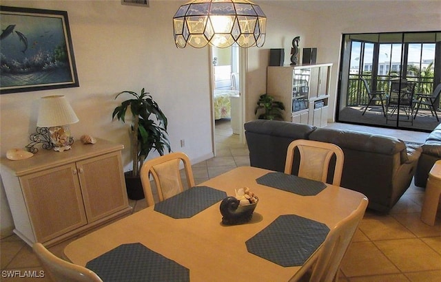 4265 Bay Beach Ln Unit 524, Fort Myers Beach, FL 33931 - dining area featuring light tile patterned floors