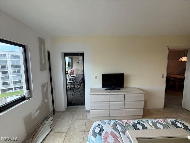 4265 Bay Beach Ln Unit 524, Fort Myers Beach, FL 33931 - bedroom featuring light tile patterned floors and baseboard heating
