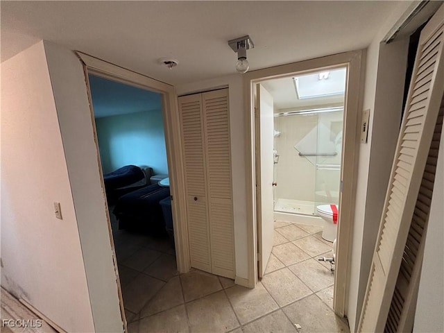 4265 Bay Beach Ln Unit 524, Fort Myers Beach, FL 33931 - hallway featuring light tile patterned flooring