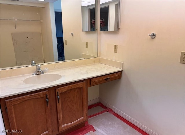 4265 Bay Beach Ln Unit 524, Fort Myers Beach, FL 33931 - bathroom featuring vanity and baseboards