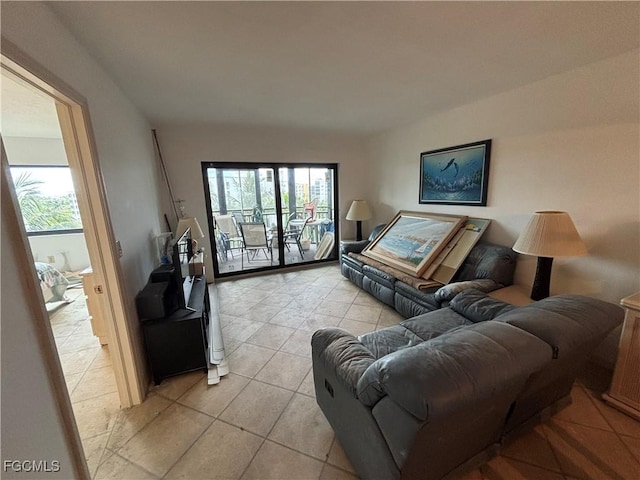 4265 Bay Beach Ln Unit 524, Fort Myers Beach, FL 33931 - living area featuring healthy amount of natural light and light tile patterned flooring