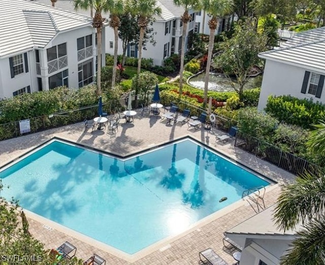 7066 Barrington Cir Unit 201, Naples, FL 34108 - community pool with a patio area