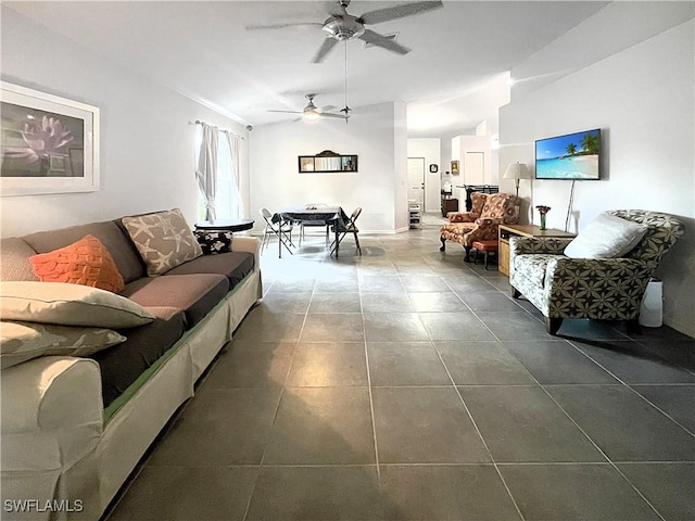 3620 Stone Way, Estero, FL 33928 - living area featuring a ceiling fan, dark tile patterned flooring, and vaulted ceiling