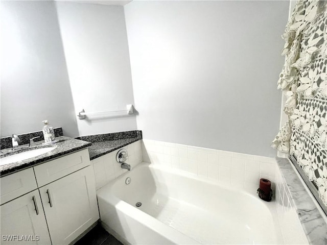 3620 Stone Way, Estero, FL 33928 - bathroom featuring a garden tub and vanity