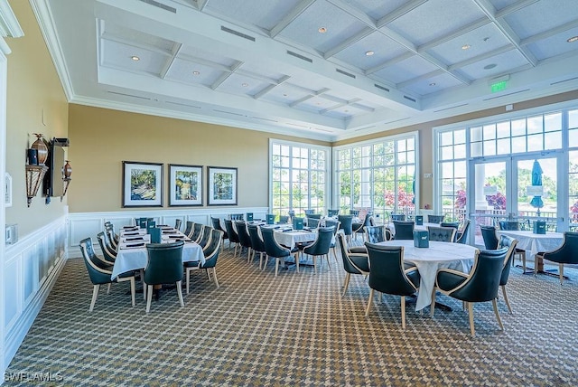 20050 Fiddlewood Ave, North Fort Myers, FL 33917 - dining area featuring coffered ceiling, carpet, beamed ceiling, a towering ceiling, and a decorative wall