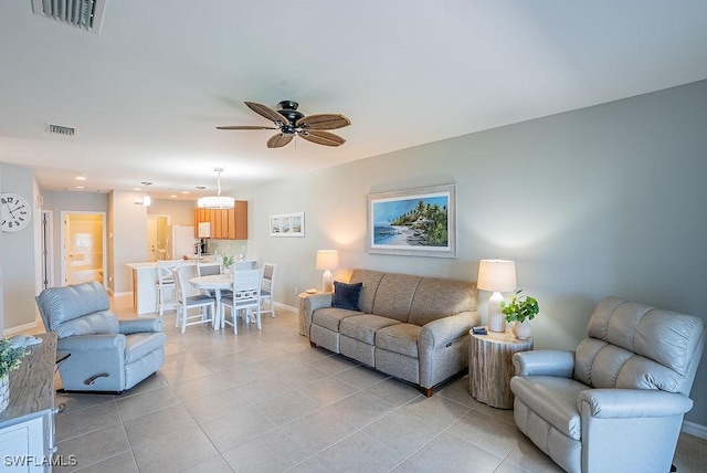 20050 Fiddlewood Ave, North Fort Myers, FL 33917 - living room featuring light tile patterned floors, a ceiling fan, and recessed lighting