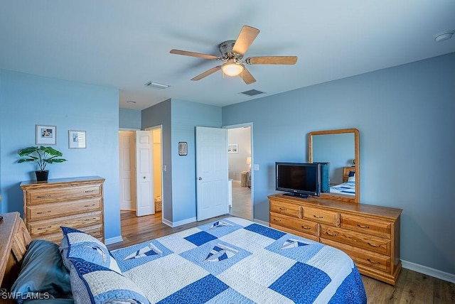 20050 Fiddlewood Ave, North Fort Myers, FL 33917 - bedroom with wood finished floors and ceiling fan