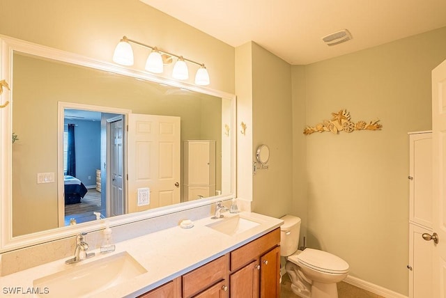 20050 Fiddlewood Ave, North Fort Myers, FL 33917 - full bath with double vanity and connected bathroom