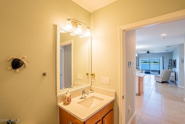 20050 Fiddlewood Ave, North Fort Myers, FL 33917 - bathroom with vanity, tile patterned floors, and ceiling fan