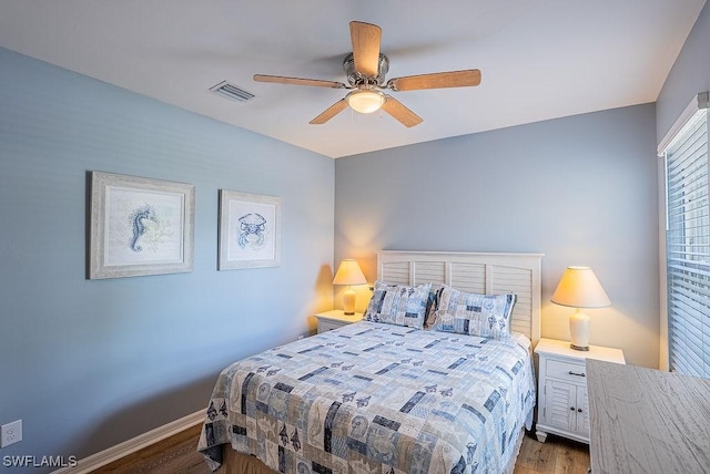20050 Fiddlewood Ave, North Fort Myers, FL 33917 - bedroom with wood finished floors and a ceiling fan