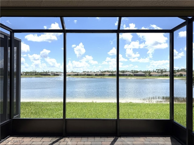 20050 Fiddlewood Ave, North Fort Myers, FL 33917 - unfurnished sunroom with a water view