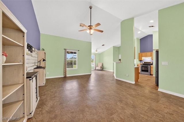 509 Scott Ave, Lehigh Acres, FL 33972 - unfurnished living room with ceiling fan and high vaulted ceiling