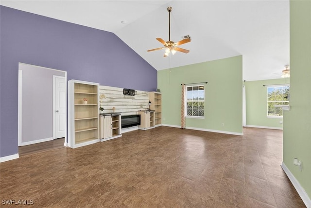 509 Scott Ave, Lehigh Acres, FL 33972 - unfurnished living room featuring a ceiling fan and high vaulted ceiling
