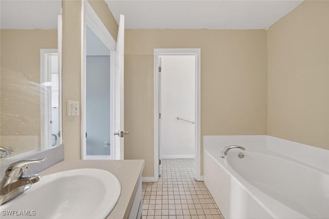 509 Scott Ave, Lehigh Acres, FL 33972 - bathroom with a bath, vanity, and tile patterned flooring
