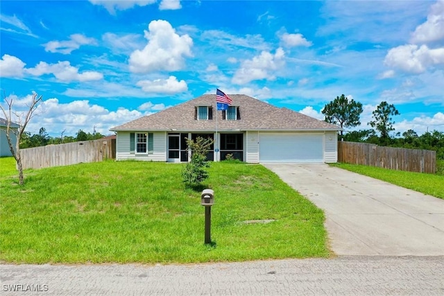 509 Scott Ave, Lehigh Acres, FL 33972 - view of front of house with concrete driveway, an attached garage, and roof with shingles