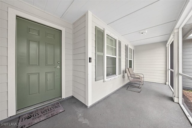 509 Scott Ave, Lehigh Acres, FL 33972 - property entrance featuring a porch