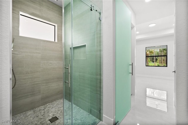 4211 12th Ave NE, Naples, FL 34120 - bathroom featuring a stall shower and recessed lighting