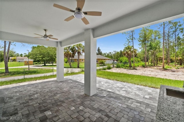 4211 12th Ave NE, Naples, FL 34120 - view of patio / terrace featuring a ceiling fan