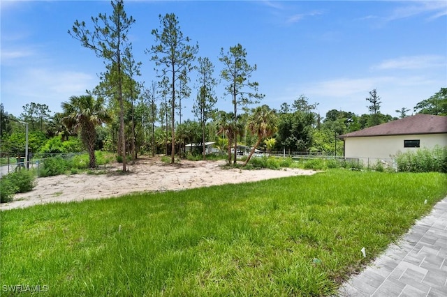 4211 12th Ave NE, Naples, FL 34120 - view of yard with view of scattered trees