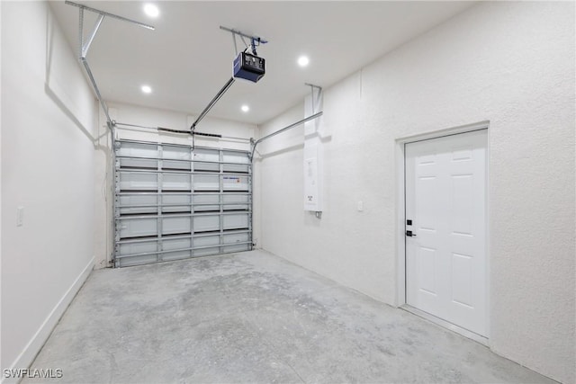 1201 E 7th St, Lehigh Acres, FL 33972 - garage with a garage door opener and recessed lighting