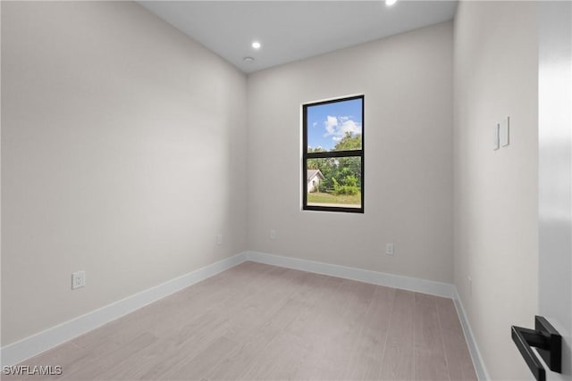 1201 E 7th St, Lehigh Acres, FL 33972 - unfurnished room with light wood-type flooring and recessed lighting