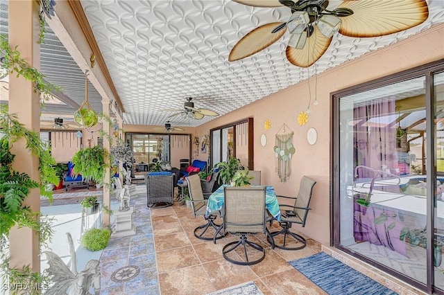 30 Bunker Ln, Rotonda West, FL 33947 - sunroom featuring an ornate ceiling and stone tile floors