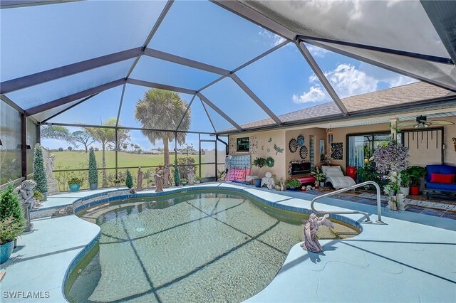 30 Bunker Ln, Rotonda West, FL 33947 - outdoor pool with a patio area and glass enclosure