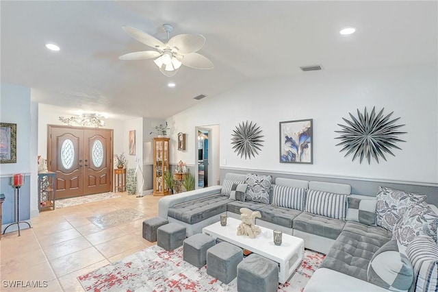 30 Bunker Ln, Rotonda West, FL 33947 - living room with lofted ceiling, light tile patterned flooring, a ceiling fan, and recessed lighting