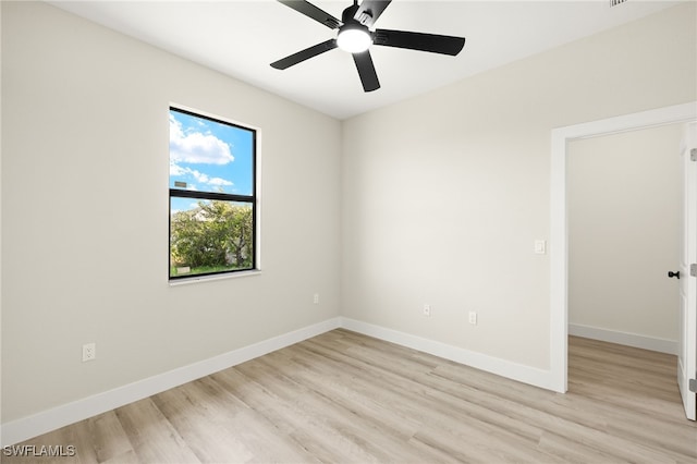 3008 20th St SW, Lehigh Acres, FL 33976 - unfurnished room with light wood-style floors and ceiling fan
