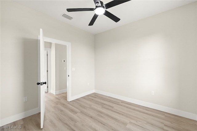 3008 20th St SW, Lehigh Acres, FL 33976 - unfurnished room with light wood-type flooring and ceiling fan
