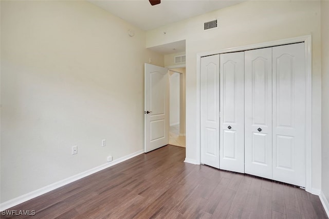 20010 Barletta Ln Unit 612, Estero, FL 33928 - unfurnished bedroom featuring wood finished floors, a closet, and a ceiling fan