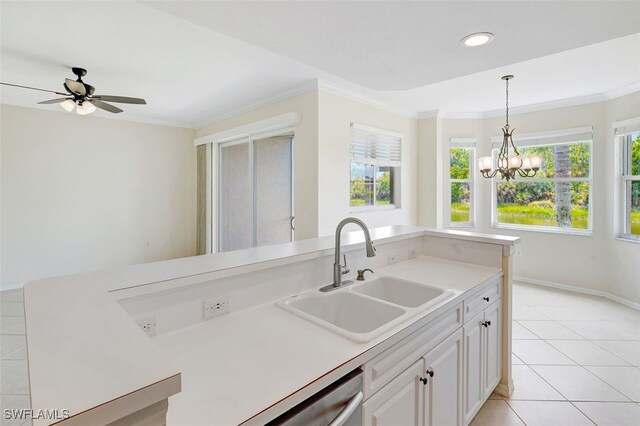 20010 Barletta Ln Unit 612, Estero, FL 33928 - kitchen featuring light countertops, light tile patterned floors, healthy amount of natural light, ornamental molding, and pendant lighting