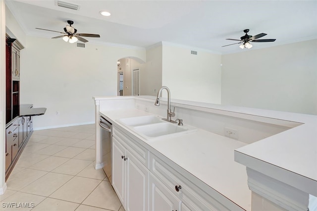 20010 Barletta Ln Unit 612, Estero, FL 33928 - kitchen with a ceiling fan, stainless steel dishwasher, arched walkways, ornamental molding, and light tile patterned floors